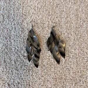 Feather-like statement earrings